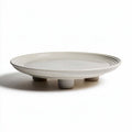 Piatto in ceramica grigia con piedini di supporto diametro 30 cm altezza 5 cm