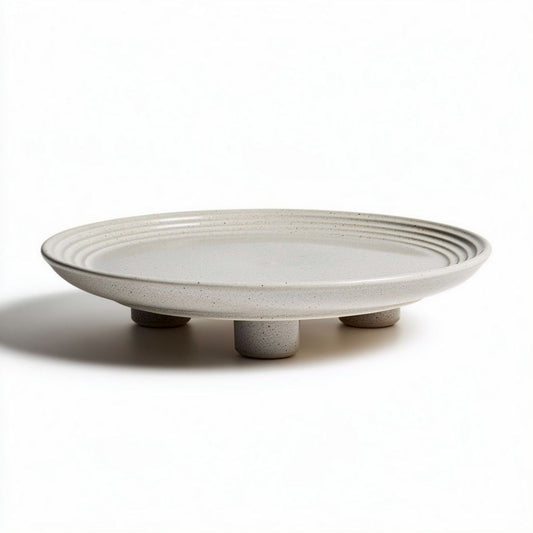 Piatto in ceramica grigia con piedini di supporto diametro 30 cm altezza 5 cm